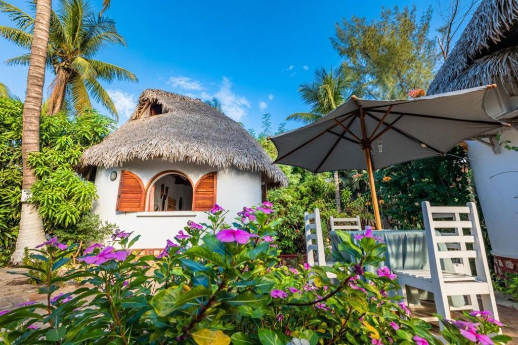 Chez Maggie Hotel & Restaurant Мурундава Экстерьер фото